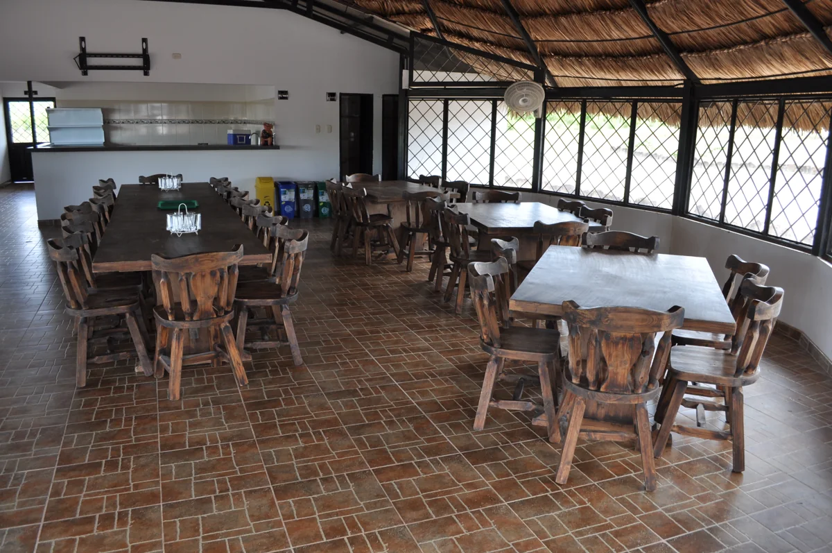 Tables and chairs inside Mi Viejo Congrio restaurant